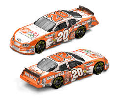 The second picture is to prove they were team issued sponsor stickers. Let S Go Racing Nascar Collectables