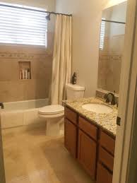 Elegant travertine tile bathroom photo in houston with granite countertops this sort of mosaic backsplash would look good in your bathroom. Bathroom Makeover Travertine Tune Up Flippinwendy