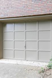 An insulated garage door is better if you live in a three or four season climate and your garage is attached to your home, or if there's finished space once the door has been properly prepped, it must be painted within 24 hours. How To Paint Over A Chipped Garage Door Diy Wood Garage Door Transformation On A Budget