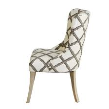 Elegant dining chair with classic taupe velvet upholstery, polished silver stud detailing and dark brown birch wood legs. Mayfair Upholstered Dining Chair Bamboo Lattice Florence Broadhurst