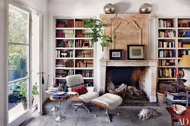 Before you start the fun job of decorating, it's time to reduce clutter in the living room and get organised. How To Decorate A Bookshelf 25 Stylish Design Tips For Your Bookcases Architectural Digest