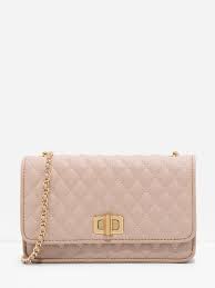 Based in singapore, the brand has a global footprint across asia, europe, latin america and. Nude Quilted Chain Strap Bag Charles Keith Us
