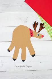 Free download 37 best quality christmas reindeer coloring pages at getdrawings. Reindeer Paper Craft For Christmas Fun Handprint Art