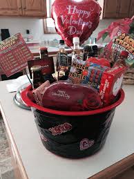 While we await beautiful bouquets and gifts that sparkle, isn't it high time to scope out valentine gift ideas for him? Valentines Day Basket For Him I Used 6 Ipa Beers Different Whiskey Valentines Day Gifts For Him Boyfriends Valentine Gift Baskets Valentines Baskets For Him