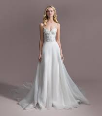 These dresses reflected a growth in disposable income among many americans and europeans. All That Glitters Beaded Wedding Gowns From Jlm Couture Designers Jlm Couture