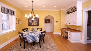 kitchen cabinets with yellow walls