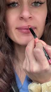 Why am I like this? Trying to achieve symmetry and cover up with lipstick