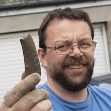 Father finds prehistoric dolphin while digging a pool