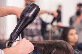Got a bit of a messy mop on your head that needs to be taken care of? Close Up Hairdresser Blow Dry For Client Hair In Hairdressing Stock Photo Picture And Royalty Free Image Image 37762493