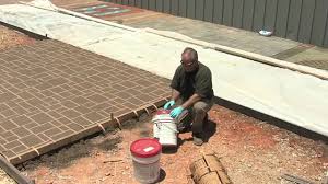 Decorative concrete works as a great choice and wise investment for enhancing concrete first, you need to plan for the project work and prepare the area you are looking to decorate with concrete. Concrete Stencils Using Stencils On Exterior Concrete Youtube