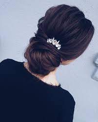 This Pretty Updo Wedding Hairstyle With Hair Accessories Perfect For Any Wedding Venue Hair Styles Wedding Hairstyles Natural Curls Hairstyles