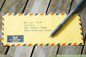 To finish, place the stamp in the top right corner. How To S Wiki 88 How To Address An Envelope With Attention