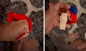 3 slip a rubber band around the pin of the security tag. Himqsu09uabham