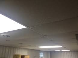 Recessed lighting is installed between the ceiling joists using recessed lighting housing. House Dash Home Basement Remodel Lighting
