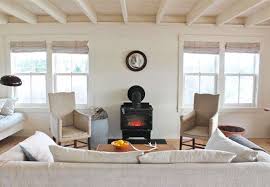 Curtains installed from the ceiling Expert Advice 11 Tips For Making A Room Look Bigger Remodelista