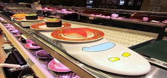 Sushi Trains Or Conveyor Belt Sushi Is A Fun Way To Experience Sushi Find Out Where The Longest Sushi Train Tokyo Restaurant Sushi Restaurants Japanese Sushi