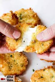 Lightly breaded veal patties with a layer of real mozzarella cheese and savory tomato sauce. Amazing Fried Mozzarella How To Feed A Loon