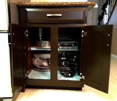 Because kitchen nooks often feature a recessed or corner area, the surrounding walls can help to define your work space. Transforming A Kitchen Desk Into Cabinet Space Tutorial