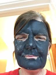 What type of white face cream is Eric applying that the rain doesn't wash  it off until the final battle?