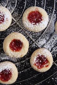 · red raspberry preserves or jam . Classic Thumbprint Cookies