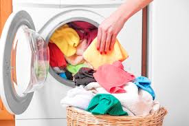 You should wash these items singularly because the colour could bleed, staining your other clothes. Woman And A Washing Machine Stock Image Image Of Cleaning Female 82786091