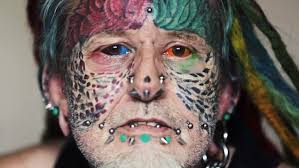 Man who wants to look like a parrot has inked his EYEBALLS