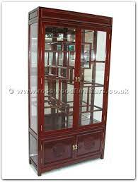 Raised on a plinth base. Rosewood Display Cabinet Longlife Design With Spot Light And Mirror Back Ff7210l