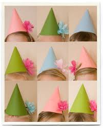 Diy Birthday Hats For Adults Paper Hats Made These Out Of Paper I Had Around And Then Fashioned Tissue Flowers To Staple To The Kids Party Decorations Party Hats Diy Kids Kids Party Hats