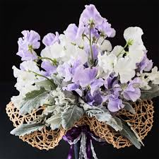 Beautiful real touch flower arrangement design has twelve real touch roses in a square vase filled with faux water. Corporate Estell S Florist