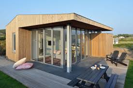 2：double glazed folding door offer a perfect solution for the cilent who need extra personal space. Using Corner Folding Glass Doors Makes This Compact Design A Real Vacation House