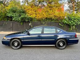 Image result for Medium Green 2002 Impala