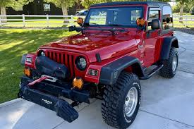 Image result for Flame Red 2004 Jeep