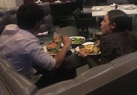 Image result for AOC eating cheeseburger tweet