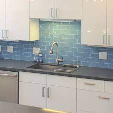 The backsplash is a mix of black, gray, and white glass mosiac tiles. Kitchen Backsplash Pictures Subway Tile Outlet