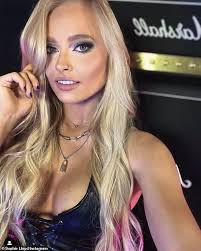 Who is Machine Gun Kelly's guitarist Sophie Lloyd?