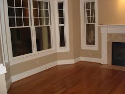 This Is The Color I M Painting My Living Room Trim In My Home Is Cream And Floors Are Pretty Close To This Ar Baseboard Styles Floor Molding White Baseboards