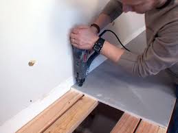 Glass and stone tiles give the bathroom a sleek, modern appearance. How To Create A Mosaic Glass Tile Countertop How Tos Diy