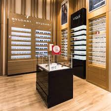 New design mdf optical shop decoration display/optical shop interior design. Presenta Nova Optical Displays