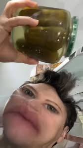 Man Searching for Pickle in the Fridge