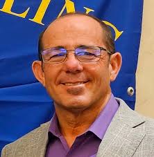 What is the name of the shrub with attractive flowers that bees love?