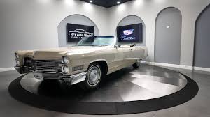 Image result for Starlight Silver 1966 Cadillac