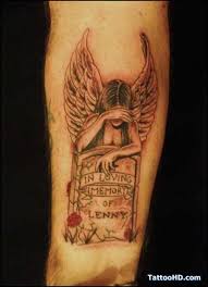 Whether you believe in angels or not, sporting an angel tattoo is really a cool idea. Angel Tattoo 141 Tombstone Tattoo Angel Tattoo Designs Memorial Tattoos