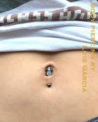 upgraded this healed lower navel piercing to this anatometalinc gem cluster navel barbell featuring moonstone an piercing belly piercing double belly piercing