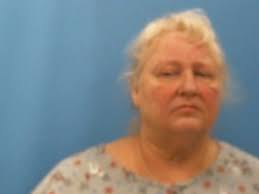 Wife charged with murder in shooting death of husband