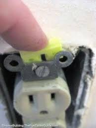 A Picture Of Me Pushing The Electrical Outlet Spacers Onto The Receptacle Home Electrical Wiring Diy Home Repair Electrical Outlets