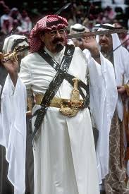 late king abdullah bin abdulaziz of saudi arabia wearing traditional clothing in preparation for performing the traditiona saudi men king abdullah saudi arabia