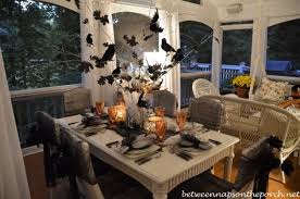 Hgtv fan debbiedoos set a frightening table with a metal skull centerpiece, red skull wine glasses and plastic bones on the place settings. 30 Magnificent Diy Halloween Table Decorations