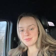 Pardon me in my pajamas in bed. This is my cat. She's about 1.5 years old.  6 lbs. small cat. Does this sometimes. Being a calico I cannot look in her  mouth.