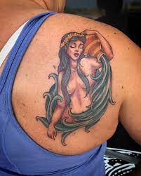 101 Amazing Aquarius Tattoo Designs You Need To See Aquarius Tattoo Aquarius Tattoo Designs Tattoo Designs