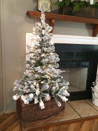 Small Flocked Christmas Tree In Old Wood Shipping Crate Flocked Christmas Trees Small Christmas Trees Christmas Tree